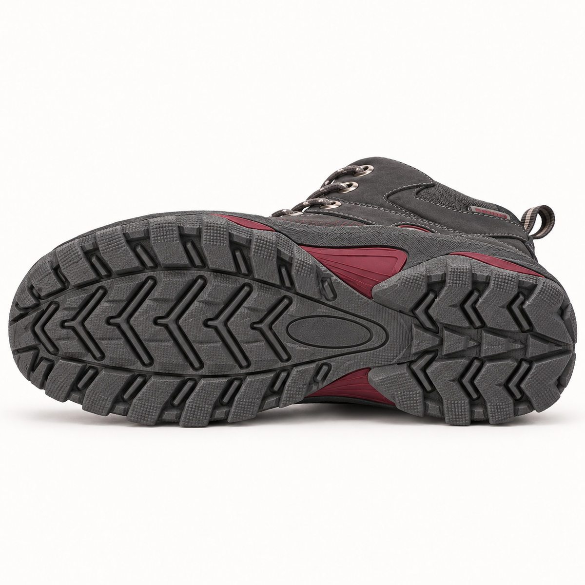 Chaussure randonnée tendinite gris foncé couchée avec semelle entièrement visible