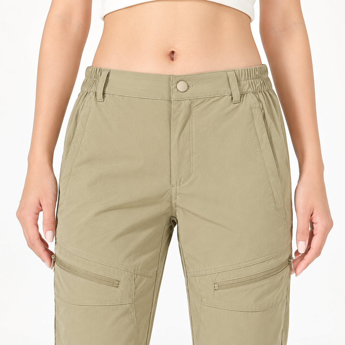 Ceinture et bouton du pantalon randonnée beige femme kaki
