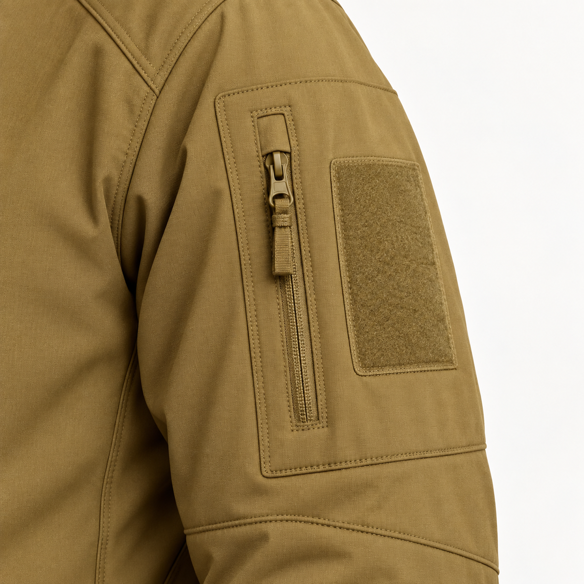 Veste de randonnée raquettes homme marron – détail de la poche de manche