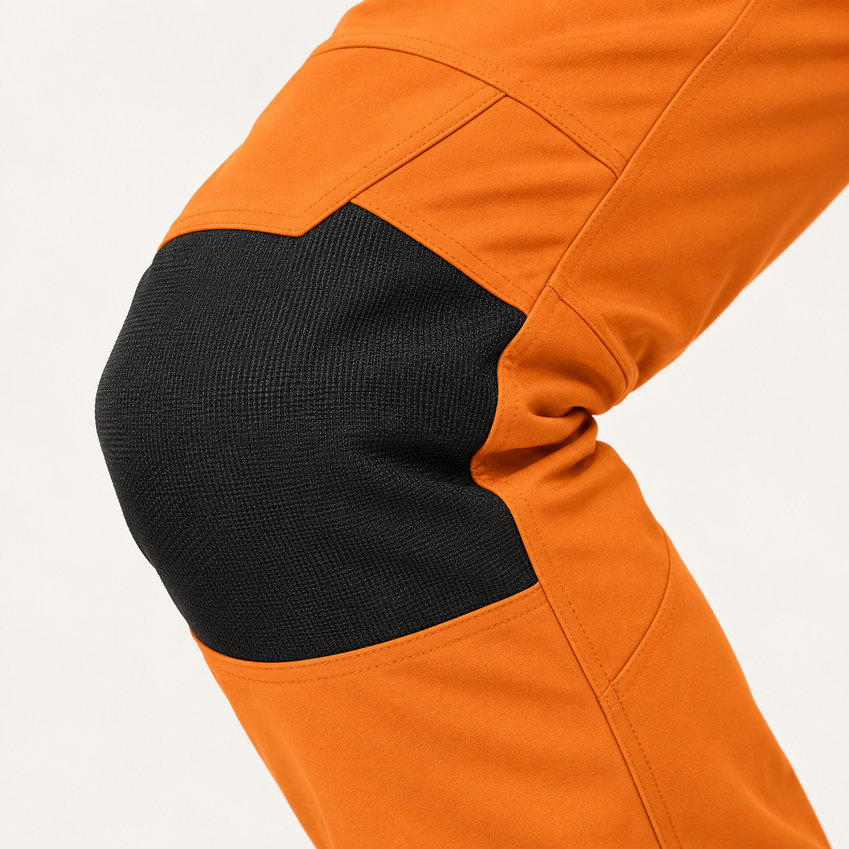 Renfort de genou du pantalon randonnée raquette homme orange