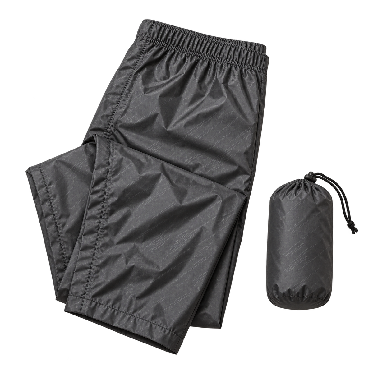Pantalon randonnée slim gris foncé plié avec sac compact