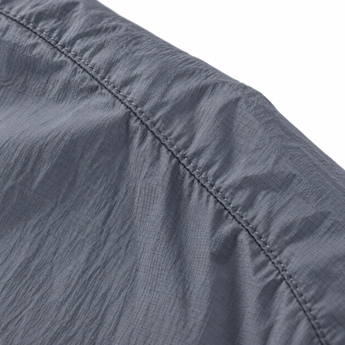 Veste pluie randonnée été homme – macro matière et couture