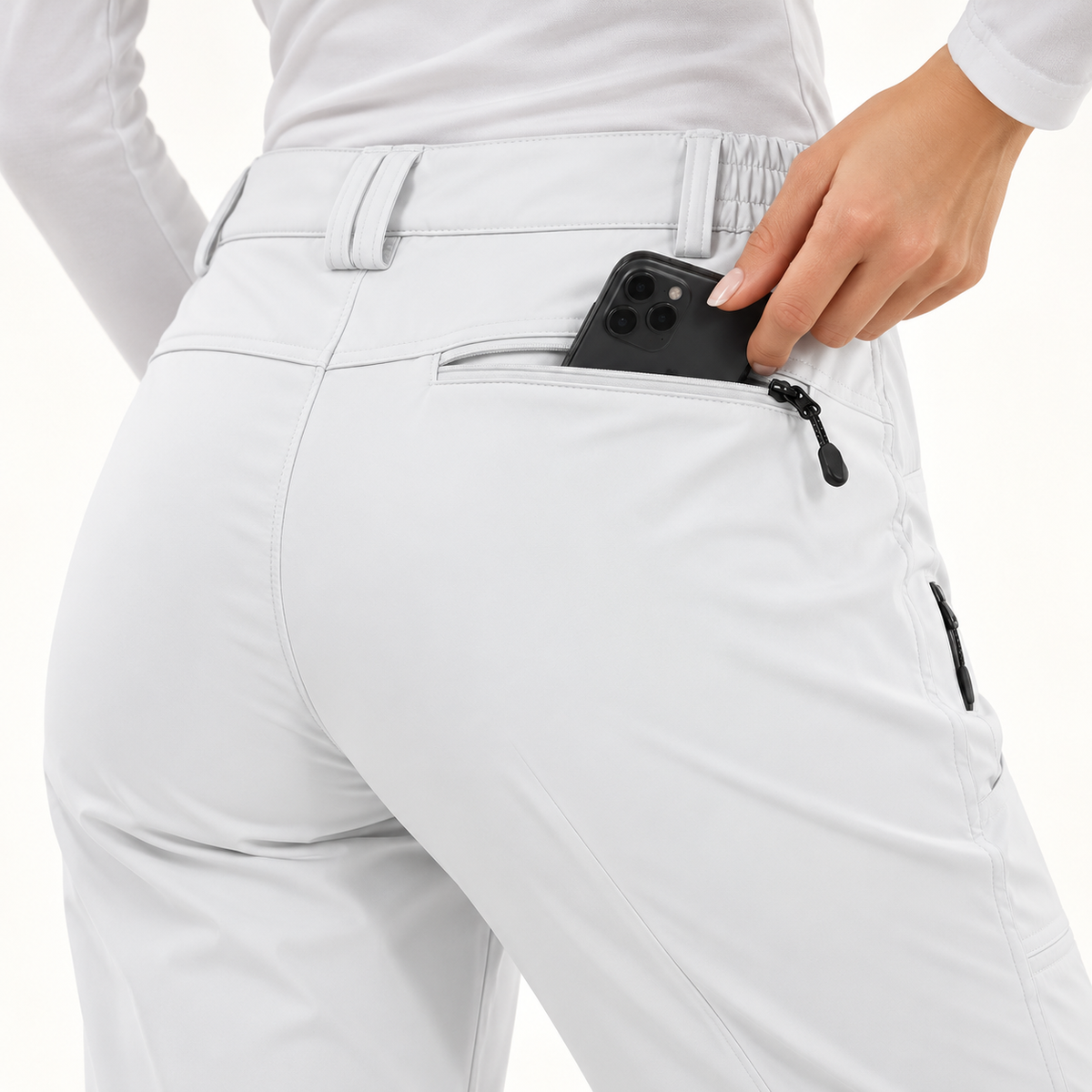 Poche arrière zippée du pantalon raquette femme