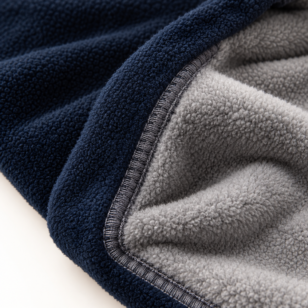 Veste polaire chaude de randonnée – macro texture et couture