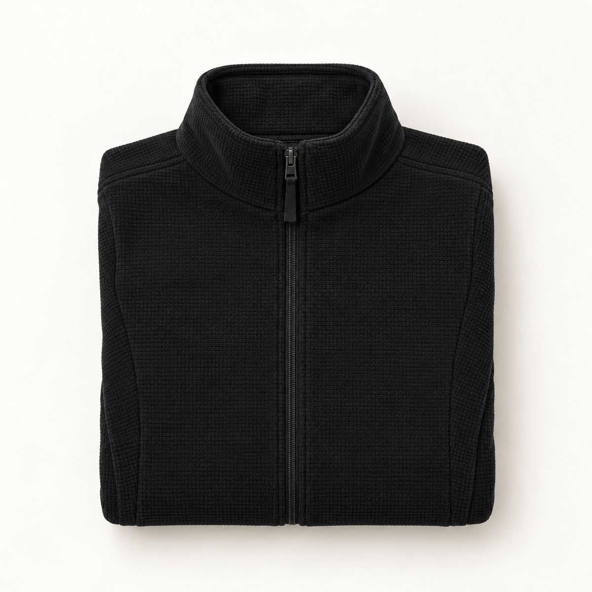 Veste polaire randonnée femme noire pliée