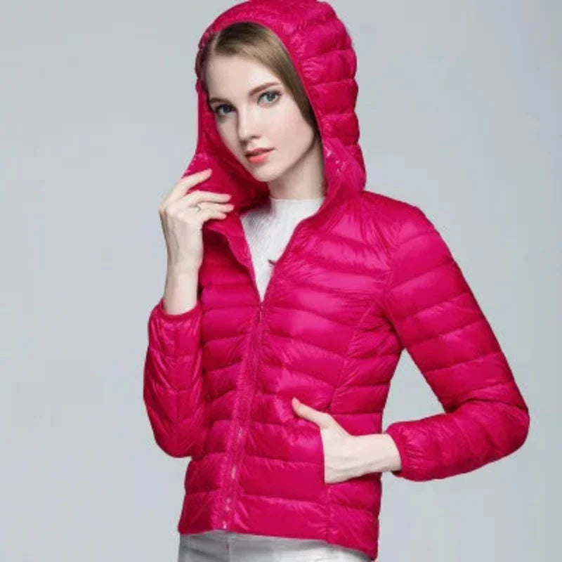 Doudoune randonnée à capuche pour femme