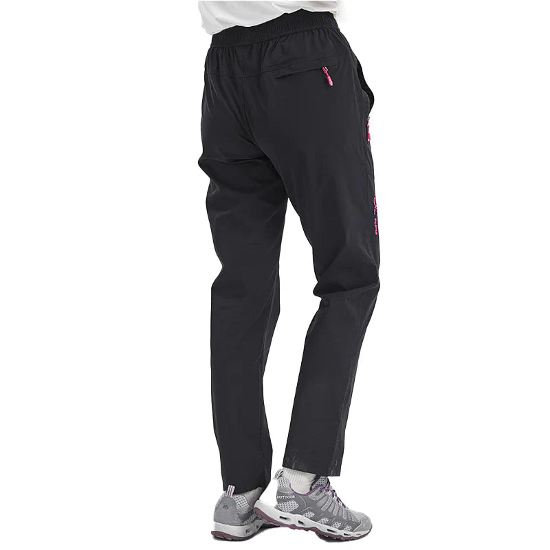 Pantalon de randonnée impermeable pour femme de dos