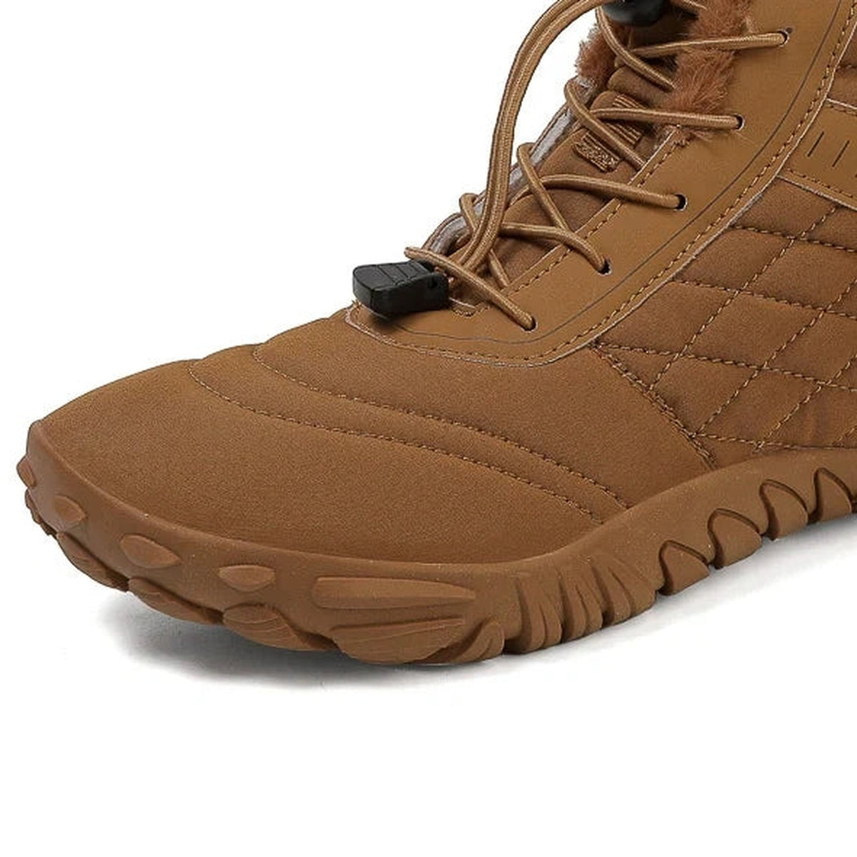 Botte de randonnée beige marron – détail de l’embout et du profil de semelle
