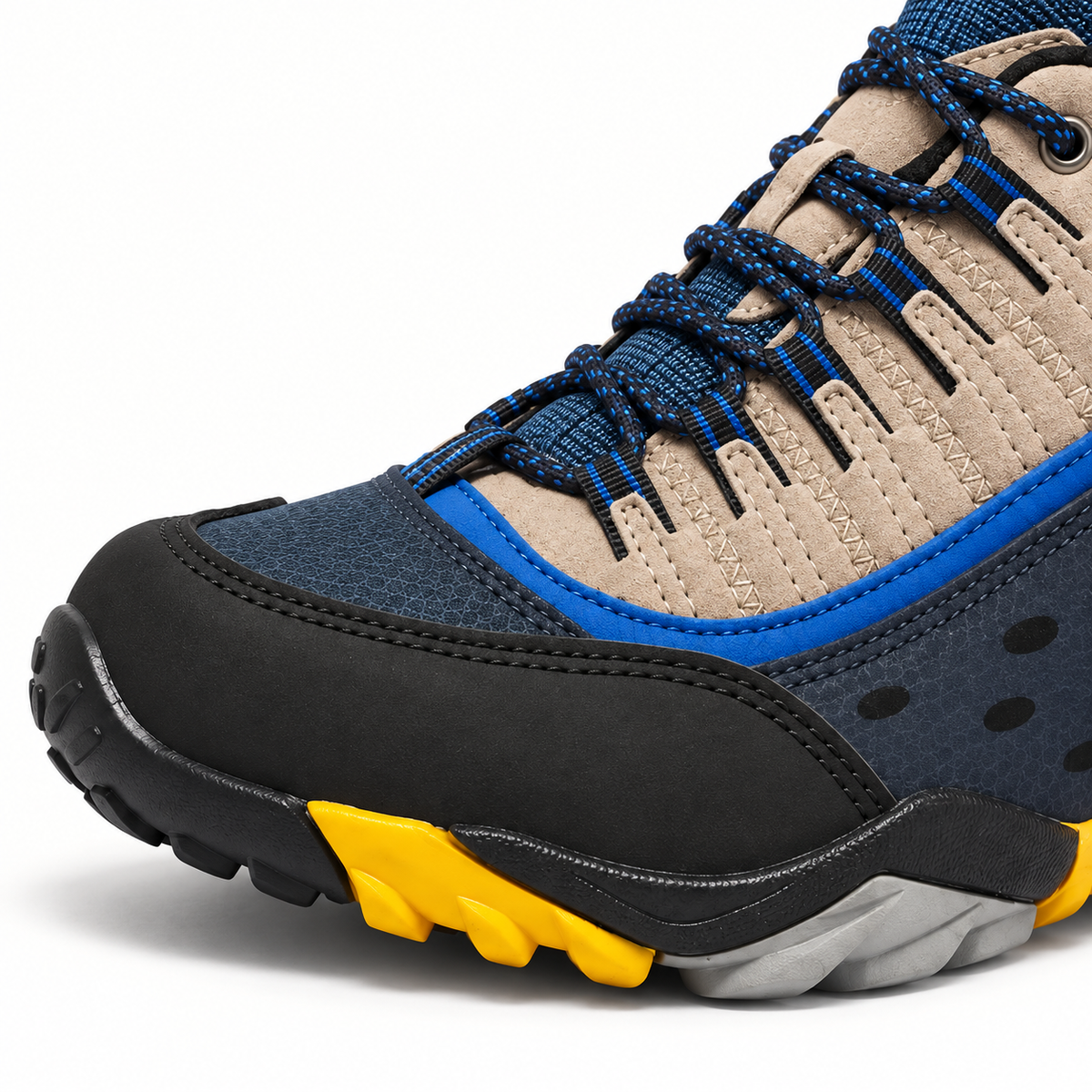 Chaussure multisport randonnée bleue – détail du pare-pierres, des lacets et des coutures
