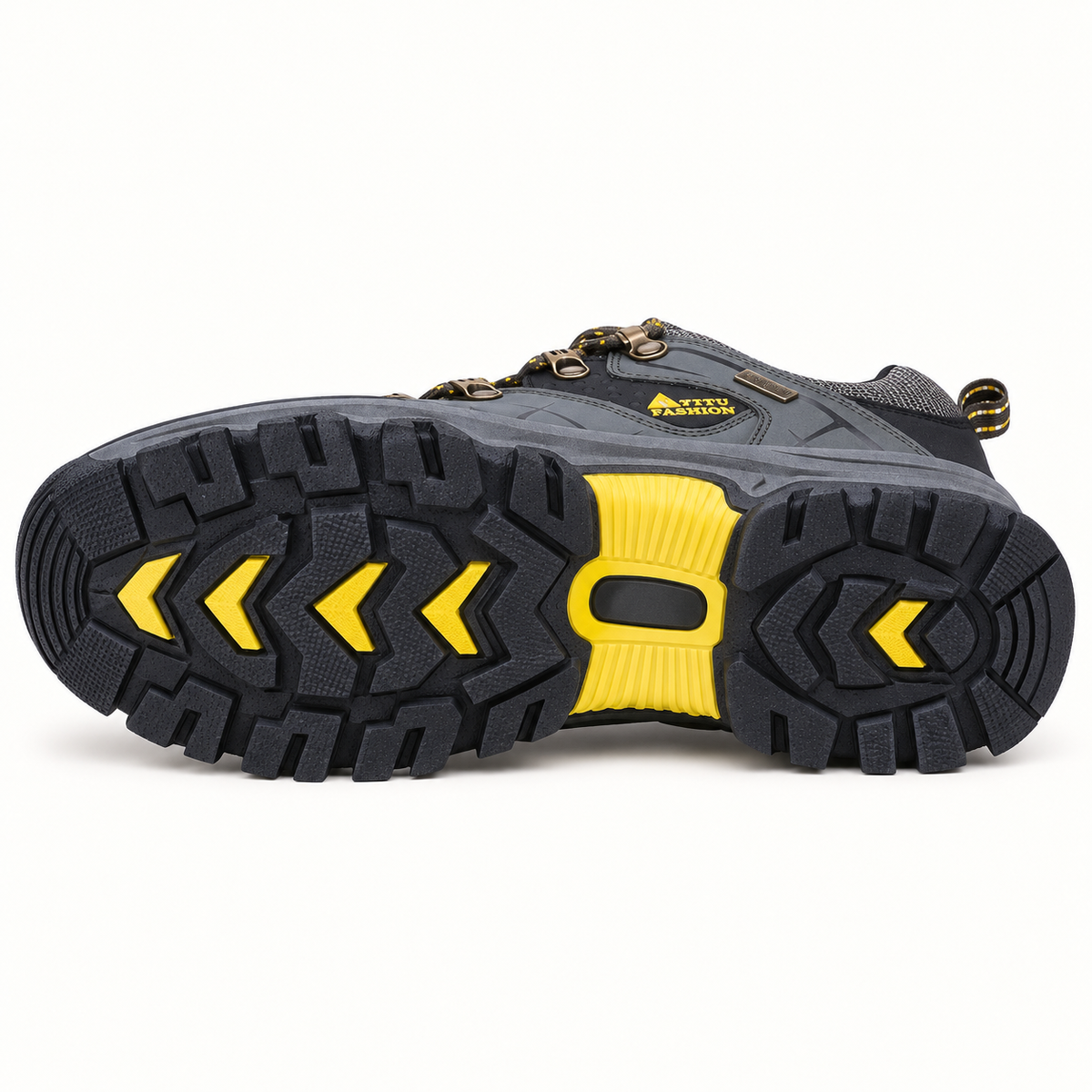 Semelle extérieure entière de la chaussure randonnée basse homme imperméable posée sur le côté