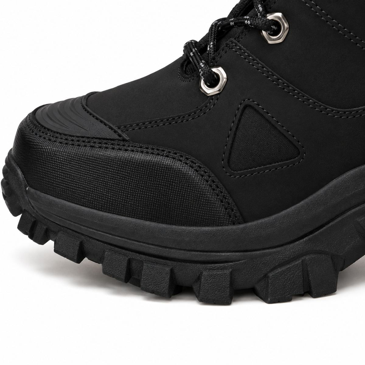 Chaussure randonnée cousu norvégien noire – détail des coutures, œillets et jonction tige-semelle
