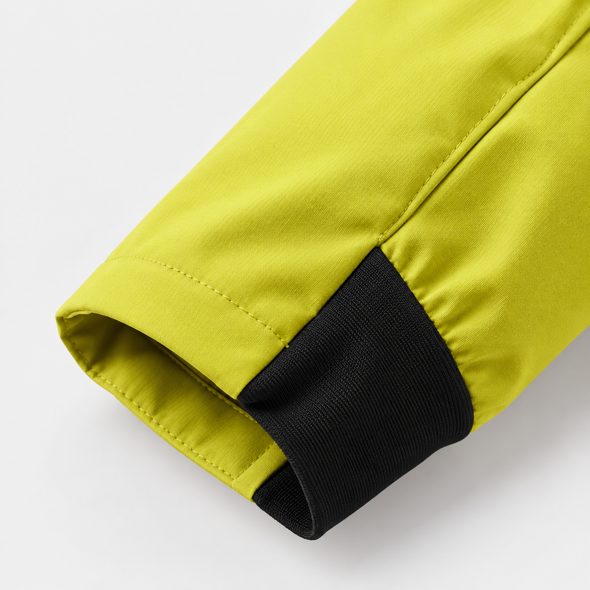 Veste de randonnée jaune femme – détail du poignet contrasté