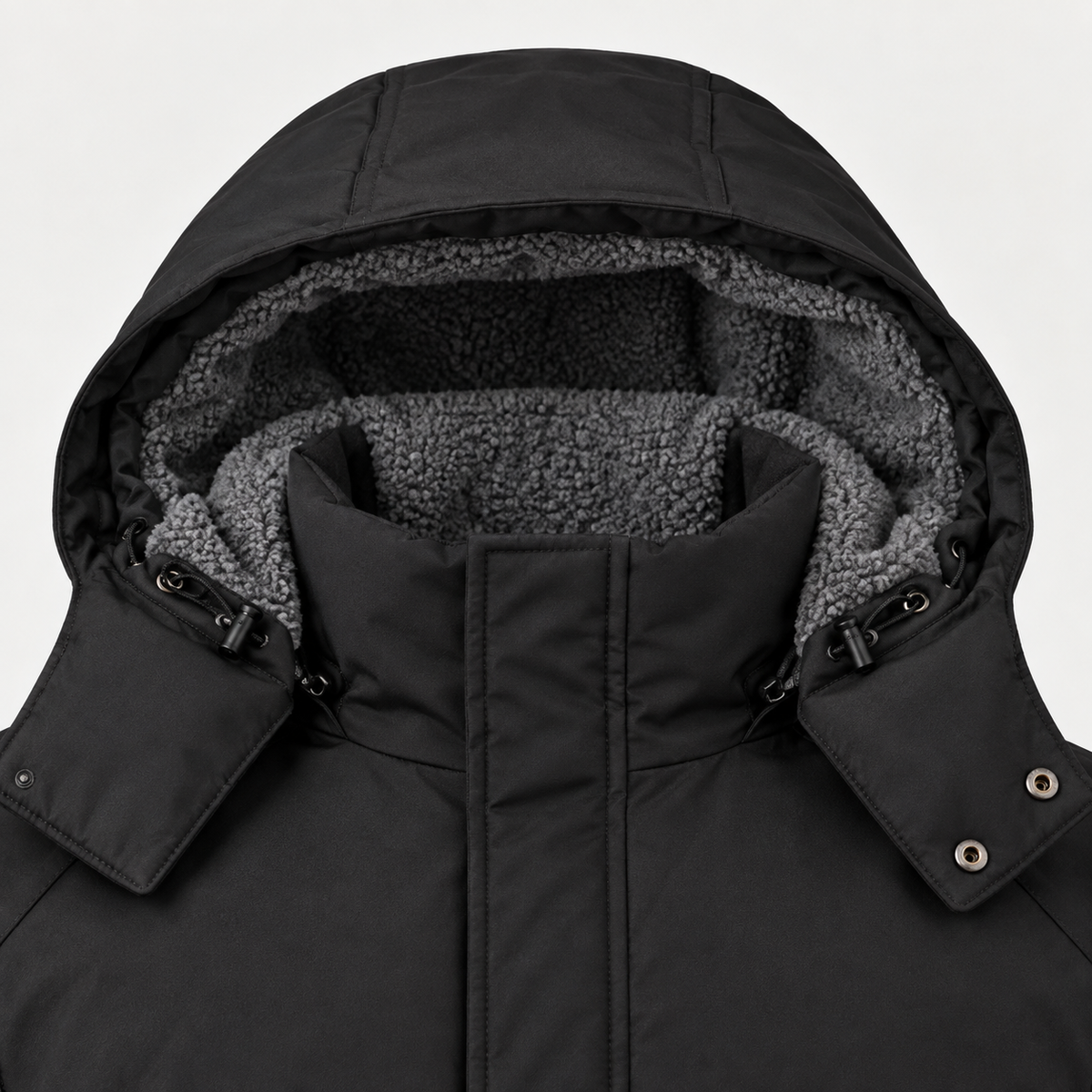 Veste randonnée haute montagne noire – détail capuche et col polaire