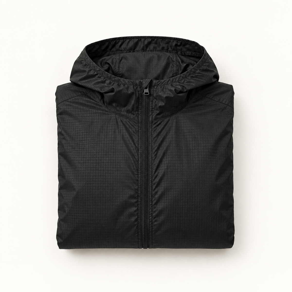 Veste randonnée nylon noire pliée – format compact